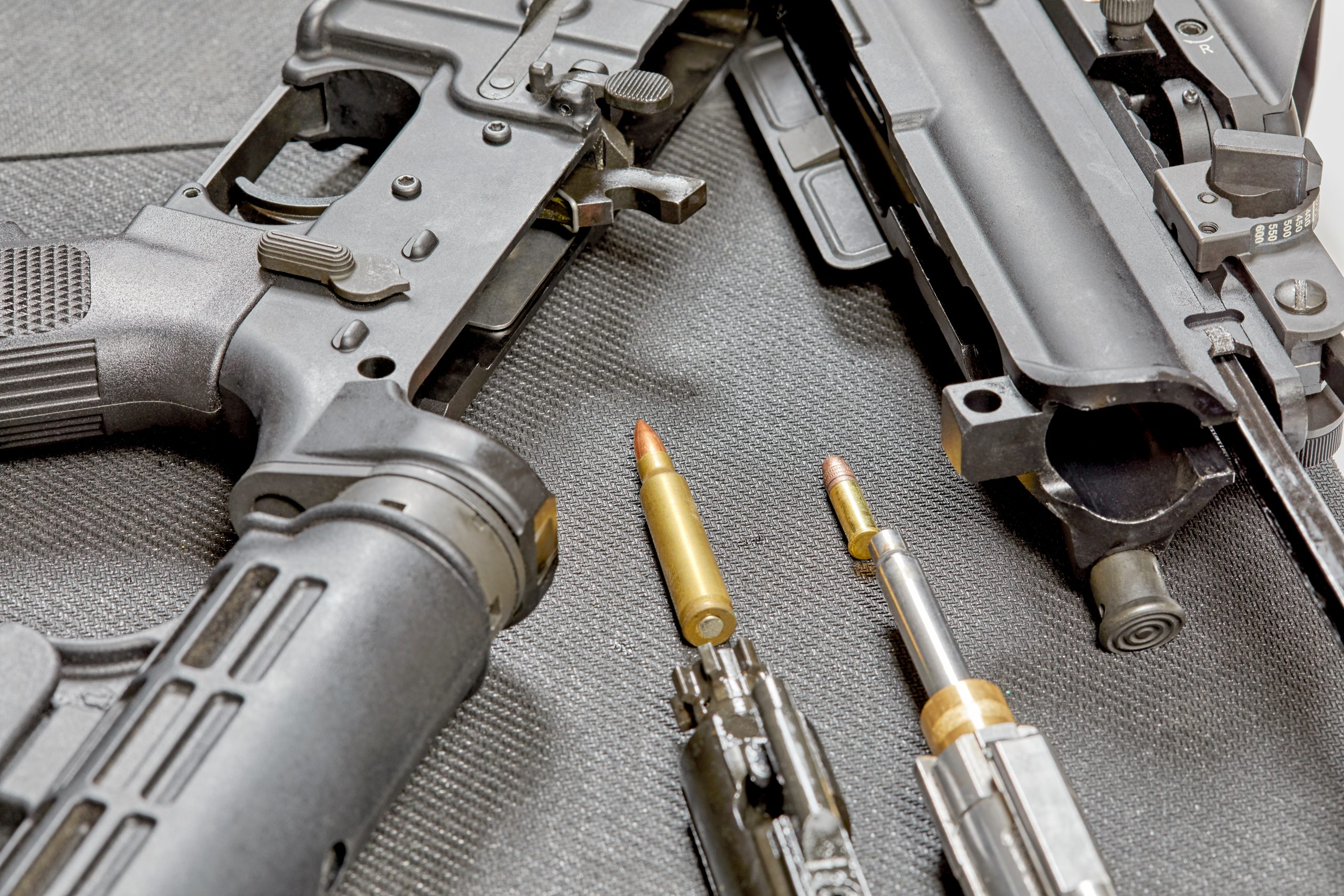 A,Disassembled,Ar15,Rifle,Laying,On,A,Table,With,A